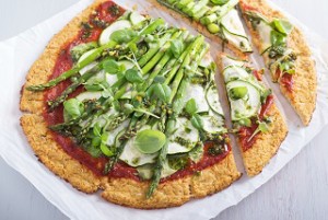 Cauliflower green pizza with spinach, zucchini and asparagus