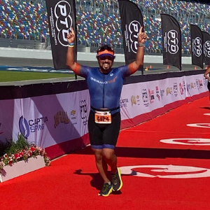 The Endurance Edge triathlon athlete finishing 70.3